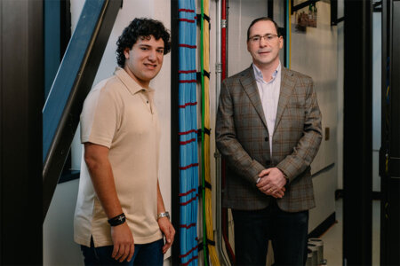 Juan Marco Saca Dada, left, and Ayad Barsoum, Ph.D., explore a server room in the Blank Sheppard Innovation Center.