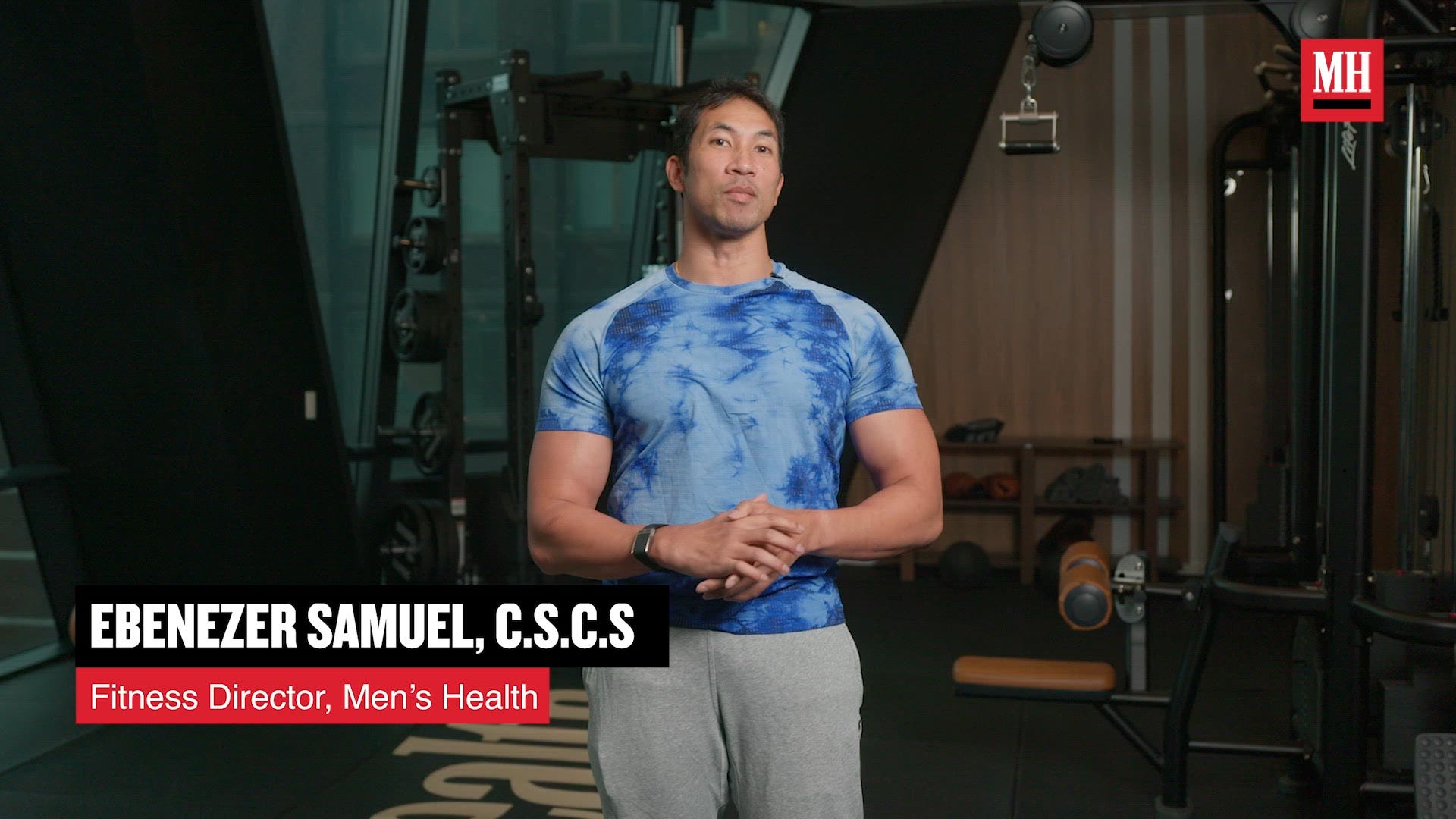 Tech Gifts That Will Help Him Train Better man standing outdoors showcasing a fit physique